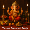 A sacred Taruna Ganapati Pooja setup featuring a beautifully adorned Lord Ganesha idol surrounded by vibrant flowers, lit oil lamps, and traditional offerings, radiating divine energy and spiritual blessings.