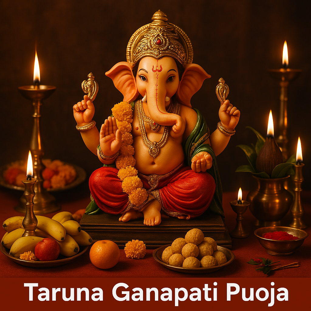 A sacred Taruna Ganapati Pooja setup featuring a beautifully adorned Lord Ganesha idol surrounded by vibrant flowers, lit oil lamps, and traditional offerings, radiating divine energy and spiritual blessings.
